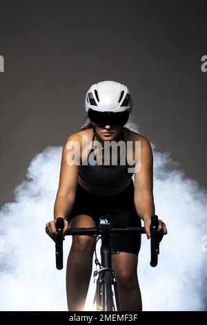 Happy joyful healthy female cyclist Stock Photo by ©roboriginal 10498660