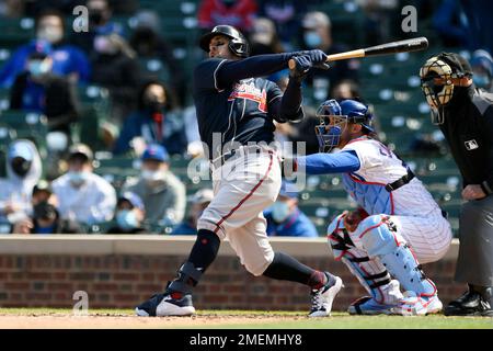 Atlanta Braves' Sean Kazmar Jr., right, slides safely in third base on a  hit by Freddie Freeman as New York Yankees third baseman Oswaldo Cabrera,  left, tries to make the tag in