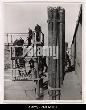 A photograph capturing the critical role of Coast Guard personnel in ...