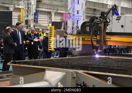 Alex Chalk, Minister for Defence Procurement(second left) makes the first cut of steel for the Royal Navy frigate, HMS Active, the Royal Navy's second in class Type 31 frigate, at Babcock International at Rosyth Dockyard on the Firth of Forth at Rosyth, Fife. Picture date: Tuesday January 24, 2023. Stock Photo