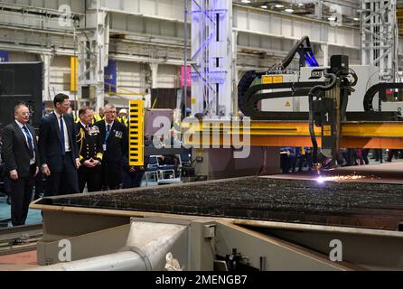 Alex Chalk, Minister for Defence Procurement(second left) alongside Martin Connell, The Second Sea Lord as the first cut of steel for the Royal Navy frigate, HMS Active, the Royal Navy's second in class Type 31 frigate is made at Babcock International at Rosyth Dockyard on the Firth of Forth at Rosyth, Fife. Picture date: Tuesday January 24, 2023. Stock Photo