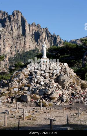 France, Corsica, Aiguilles de Bavella - statue of Notre-Dame-des-Nieges adorned with votive plaques Stock Photo