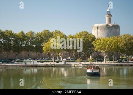 France, Languedoc-Roussillon, Gard, Aigues-Mortes, walled old town and canal, Petite Camargue Stock Photo