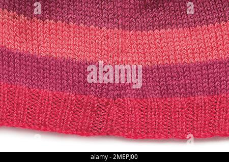 Striped rowan pure wool hat, close-up Stock Photo