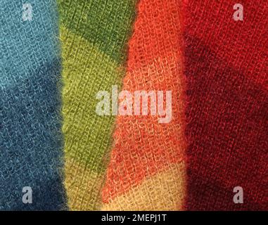 Mohair scarves knitted in different colours, close-up Stock Photo