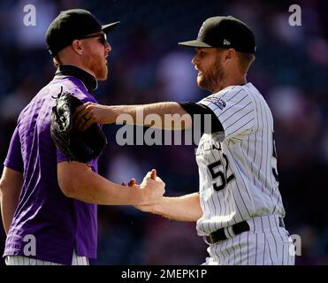 Retired Colorado Rockies first baseman Todd Helton throws out the  ceremonial first pitch before a baseball game Saturday, Aug. 19, 2023, in  Denver. (AP Photo/David Zalubowski Stock Photo - Alamy