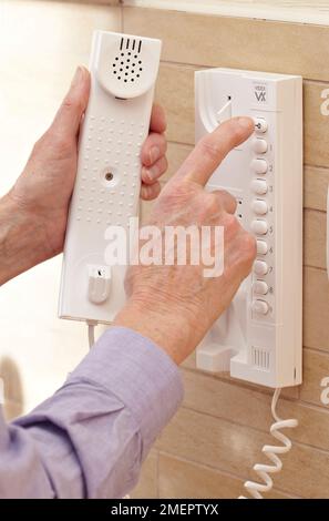 Home safety and security, using an intercom Stock Photo