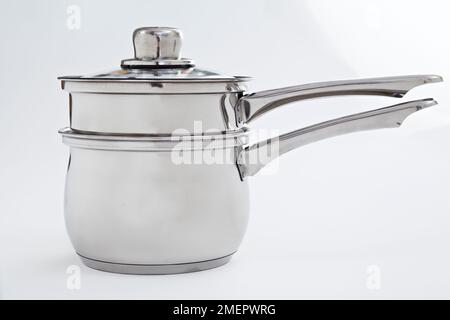 Stainless steel double-boiler pans, close-up Stock Photo