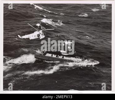 A Coast Guard helicopter rescues sailors from the vessel Hattie D ...