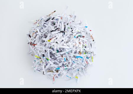 Ball of shredded waste paper, overhead view Stock Photo