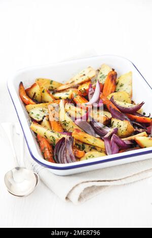 Herby roasted root vegetables Stock Photo