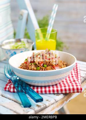 Jambalaya, Creole dish with vegetables, meat, and rice, served in bowl Stock Photo