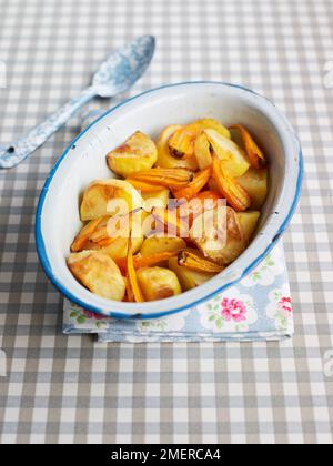 Roast vegetables, potatoes and carrots Stock Photo