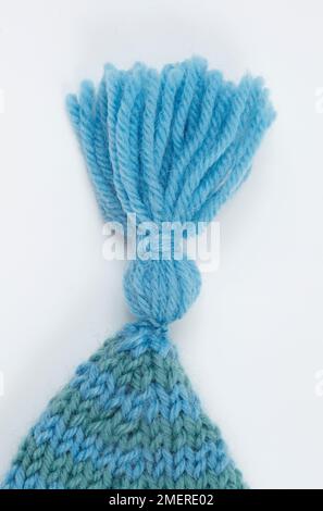 Tassle of knitted hat Stock Photo
