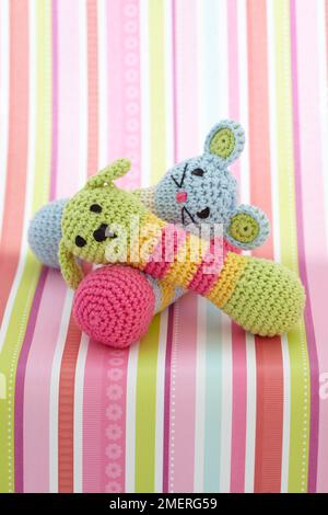 Childrens crocheted animal rattles Stock Photo