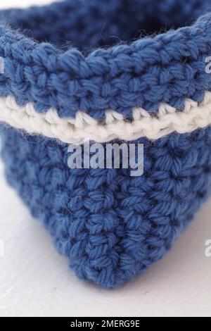 Crocheted childrens slippers Stock Photo