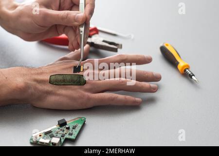 Human robotic hand in futuristic concept Stock Photo