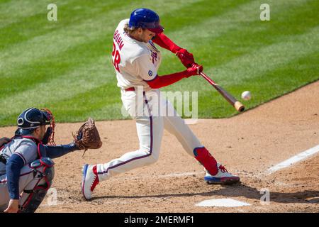 Philadelphia Phillies' Alec Bohm hits a two run home run during the seventh  inning of a baseball game against the Washington Nationals, Sunday, Sept.  11, 2022, in Philadelphia. (AP Photo/Laurence Kesterson Stock