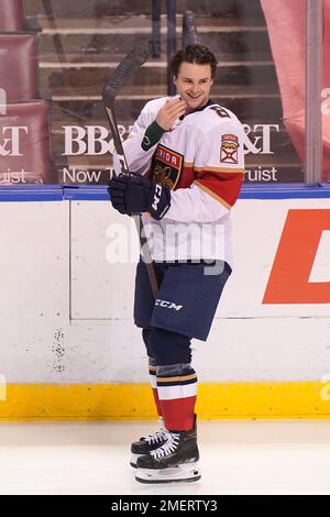 Florida Panthers defenseman Matt Kiersted (8) skates with the puck during  the second period at an NHL preseason hockey game against the Nashville  Predators, Sunday, Sept. 26, 2021, in Sunrise, Fla. (AP