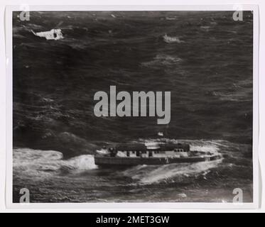 Coast Guard helicopter rescues Navy Lieutenant J.D. Tomko after he ...