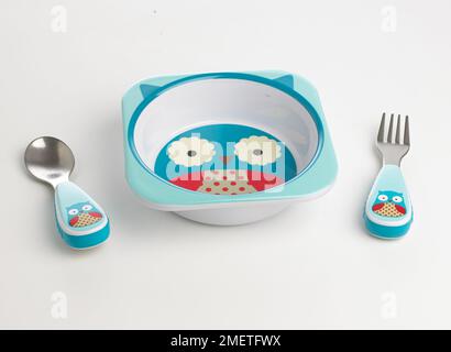 Owl bowl and matching fork and spoon Stock Photo