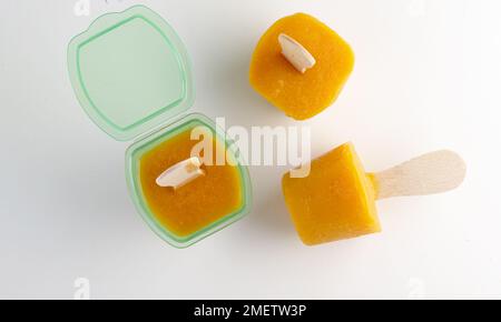 Mango puree ice lolly Stock Photo