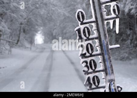 thermometer shows cold temperature at winter day Stock Photo
