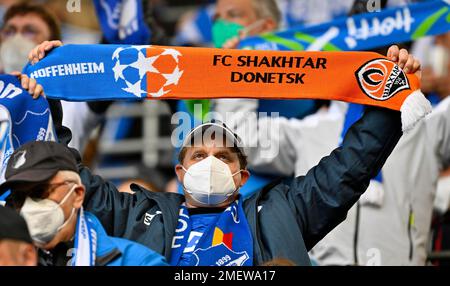 Hoffenheim fan with combined fan scarf FC Shakhtar Donetsk, a city in Ukraine, PreZero Arena, Sinsheim, Baden-Wuerttemberg, Germany Stock Photo