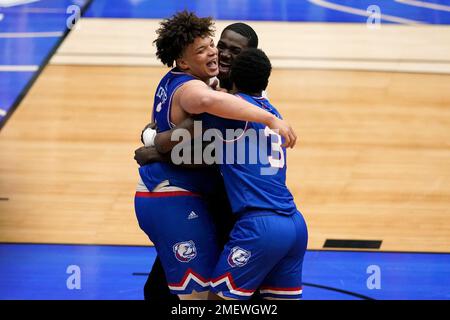 Louisiana Tech forwards Kenneth Lofton, Jr. (2) and Andrew Gordon (33)  celebrate a win over Mississippi after an NCAA college basketball game in  the NIT, Friday, March 19, 2021, in Frisco, Texas. (