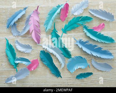 Papercraft Paper feather gift wrap Stock Photo