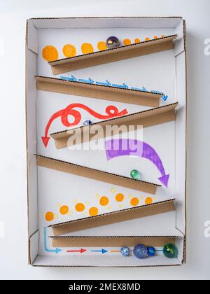 Decorated marble run with marbles in Stock Photo