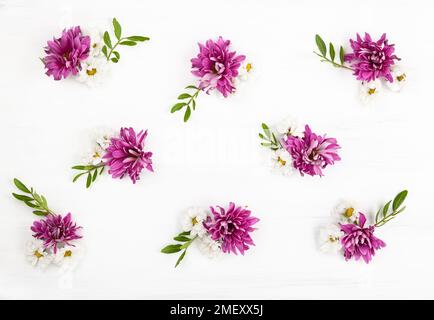 Beautiful spring flowers on white wooden background. Festive floral concept . Top view, flat lay. Stock Photo