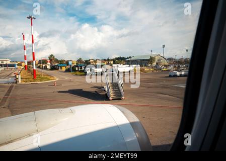 Kerkyra, Greece - 09 29 2022: View From Airplane To Boing White-Grey Engine Casing With Vanes and Airfield of Corfu Airport.  Stock Photo