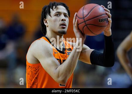 FILE - Oklahoma State guard Cade Cunningham (2) celebrates with