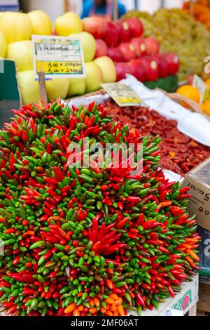 Close up of red and green chilli peppers at fruit and vegetable stand in Venice, Italy. Stock Photo