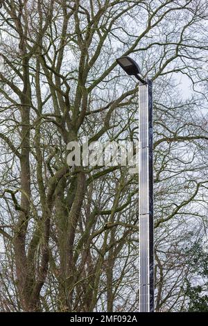 Modern self-sufficient public solar lights along the road at countryside in The Netherlands Stock Photo