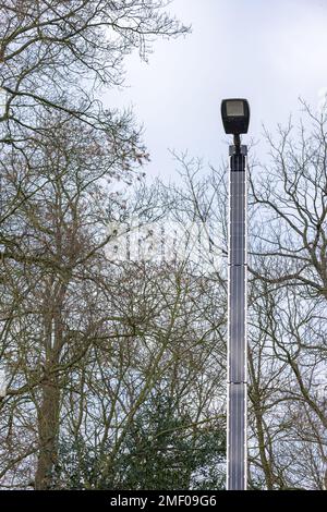 Modern self-sufficient public solar lights along the road at countryside in The Netherlands Stock Photo