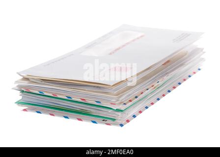 A stack of snail mail envelopes isolated on white Stock Photo