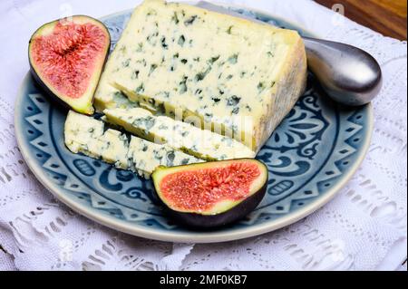 Cheese collection, piece of French blue cheese auvergne or fourme d'ambert close up Stock Photo