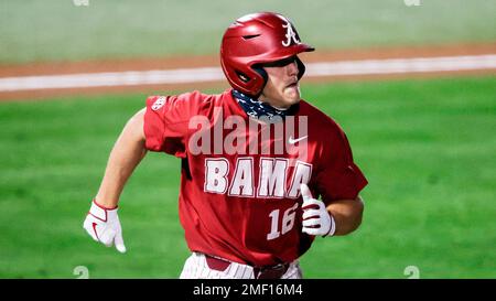 Alabama Owen Diodati (16) runs to first during an NCAA baseball