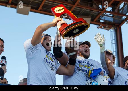 South Dakota State Jackrabbits quarterback Mark Gronowski and guard Mason McCormick celebrate the SDSU 45-21 victory over the North Dakota State Bison Stock Photo