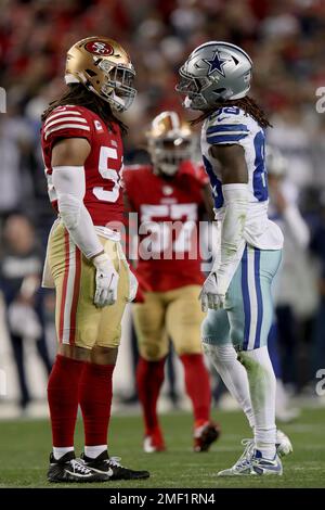 San Francisco 49ers linebacker Fred Warner (54) and Dallas Cowboys wide  receiver CeeDee Lamb (88) after a stop during an NFL divisional round  playoff football game, Sunday, Jan. 22, 2023, in Santa