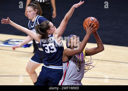 Connecticut's Aaliyah Edwards, right, shoots over St. John's Jillian ...