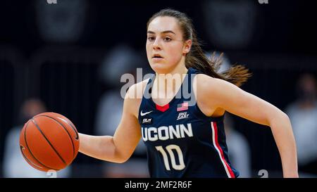 Connecticut guard Nika Muhl (10) calling a play against Creighton ...