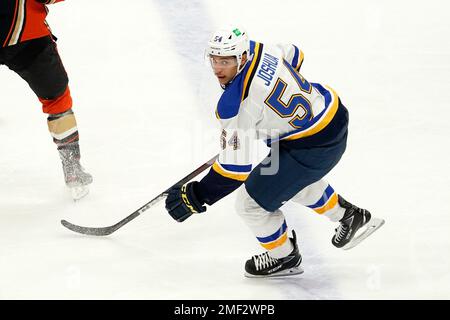 St. Louis Blues center Dakota Joshua (54) faces off against Dallas Stars  left wing Riley Tufte (27) during the second period of an NHL hockey game  on Friday, Dec. 17, 2021, in