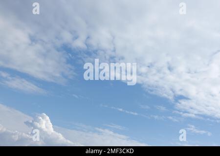 cloudy bright blue sky on a sunny day Stock Photo