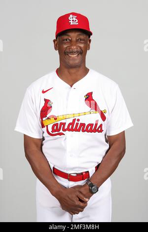 St. Louis Cardinals Hall-of-Famer Ozzie Smith gestures to his longtime  friend and teammate, assistant coach Willie McGee, on the Cardinals bench  before a baseball game between the Cardinals and the Kansas City