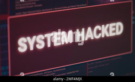 Hacked system alert message flashing on computer screen, showing security breach error and cyber crime attack. Monitor displaying system error security and computer malfunction. Close up. Stock Photo