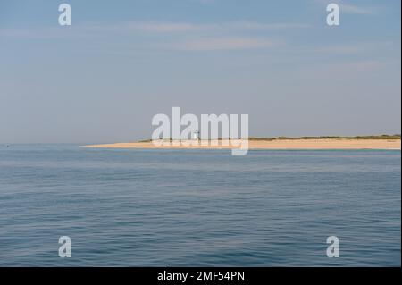 Long Point Beach and Long Point Light Station on a sunny day in Cape Cod. Cape Cod is a popular travel destination in Massachusetts. Stock Photo