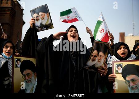 Tehran, Iran. 24th Jan, 2023. Iranian students chant slogans during their protest against cartoons published by the French satirical magazine Charlie Hebdo that lampoon Iran's ruling clerics, in front of the French Embassy in Tehran. (Photo by Sobhan Farajvan/Pacific Press) Credit: Pacific Press Media Production Corp./Alamy Live News Stock Photo